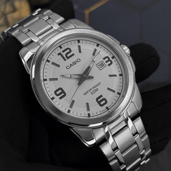 Чоловічий годинник Casio MTP-1314D-7A фото 5