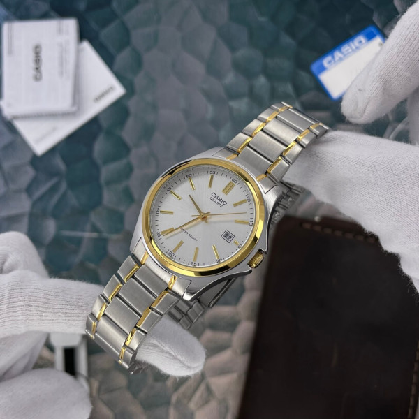 Чоловічий годинник Casio MTP-1183G-7A фото 4