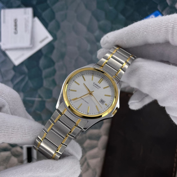 Чоловічий годинник Casio MTP-1183G-7A фото 6