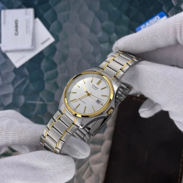 Чоловічий годинник Casio MTP-1183G-7A фото 5